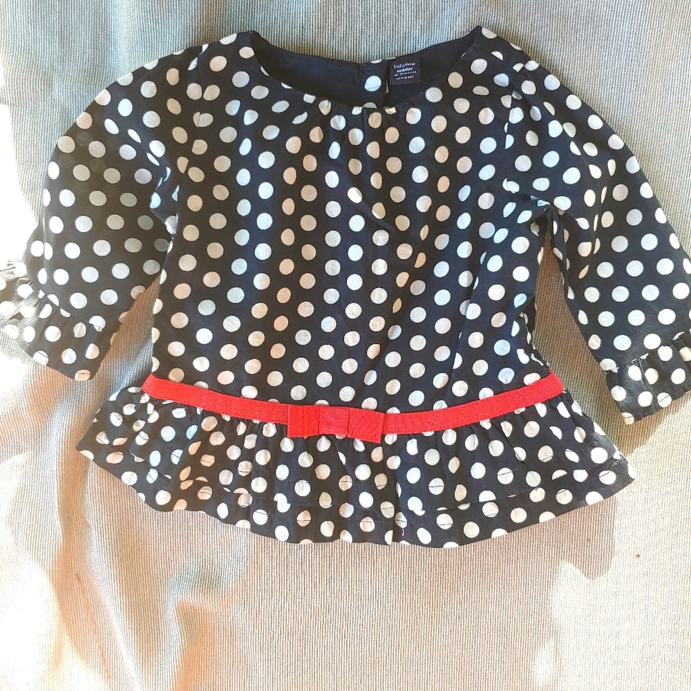 Adorable polka dot blouse with red belt design